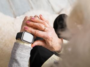 Elderly Person Using Smart Watch