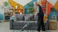 Elderly Person Vacuuming