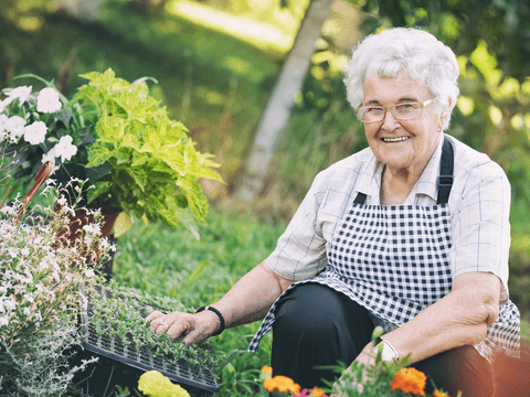 SureSafe Woman Gardening Outdoors with FallSafe