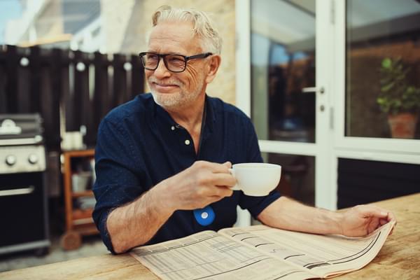 Man Wearing SureSafe Go Personal Alarm Outside