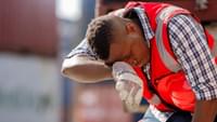 Worker Exhausted by Heat