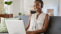 Mature black woman working from home