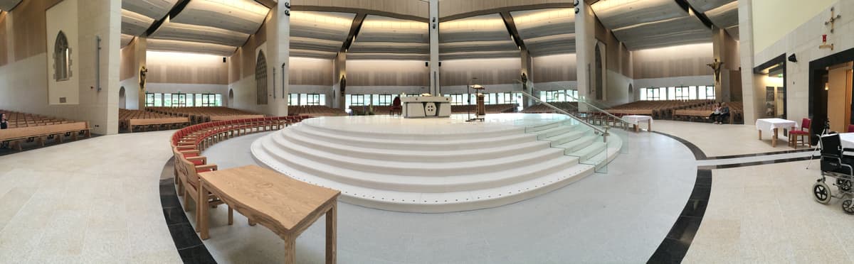 panoramic photograph of a circular alter with an invisible lift in the stairs