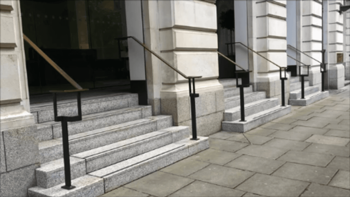 4 sets of stairs one of which hides a wheelchair lift in manchester