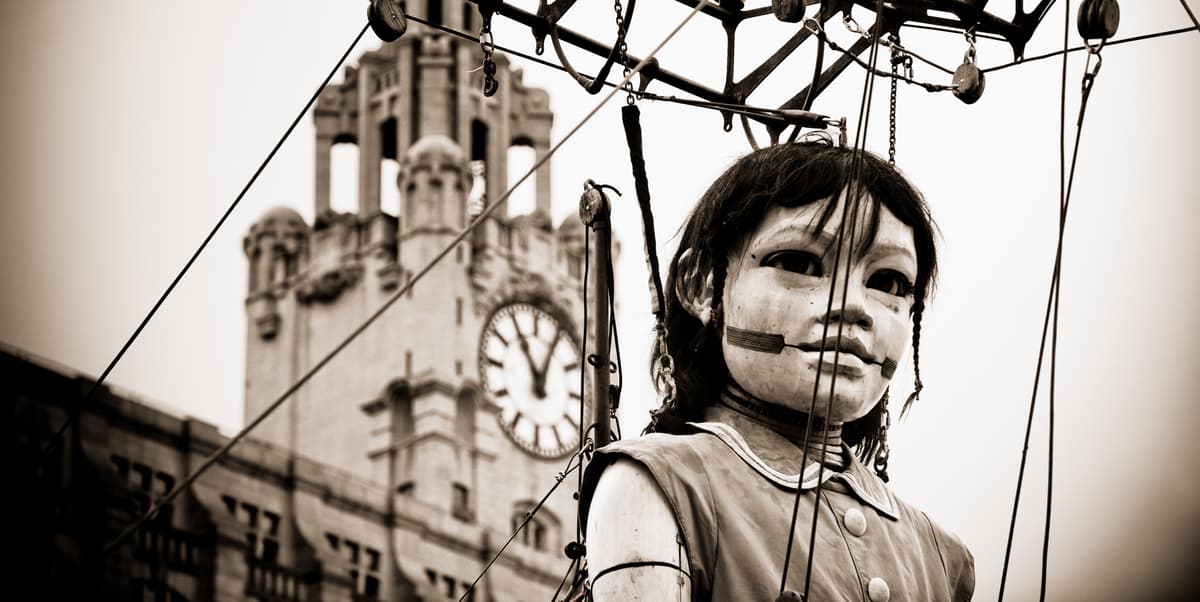 a model giant in the streets of liverpool