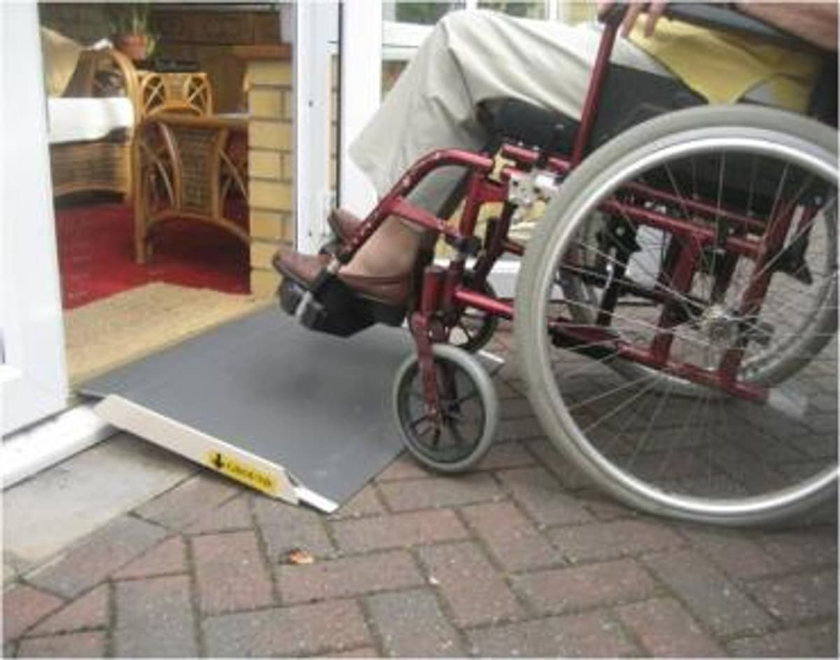 Temporary wheelchair ramp in a listed building.