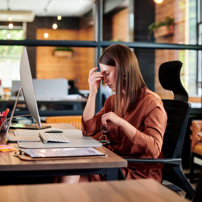 Office professional looking visibly frustrated