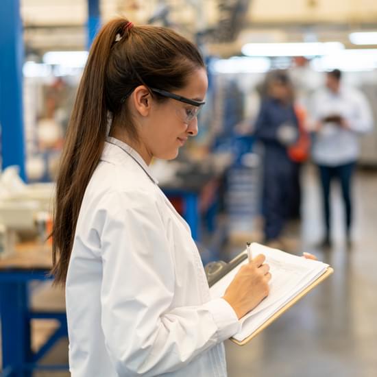 Scientist looking at their clipboard