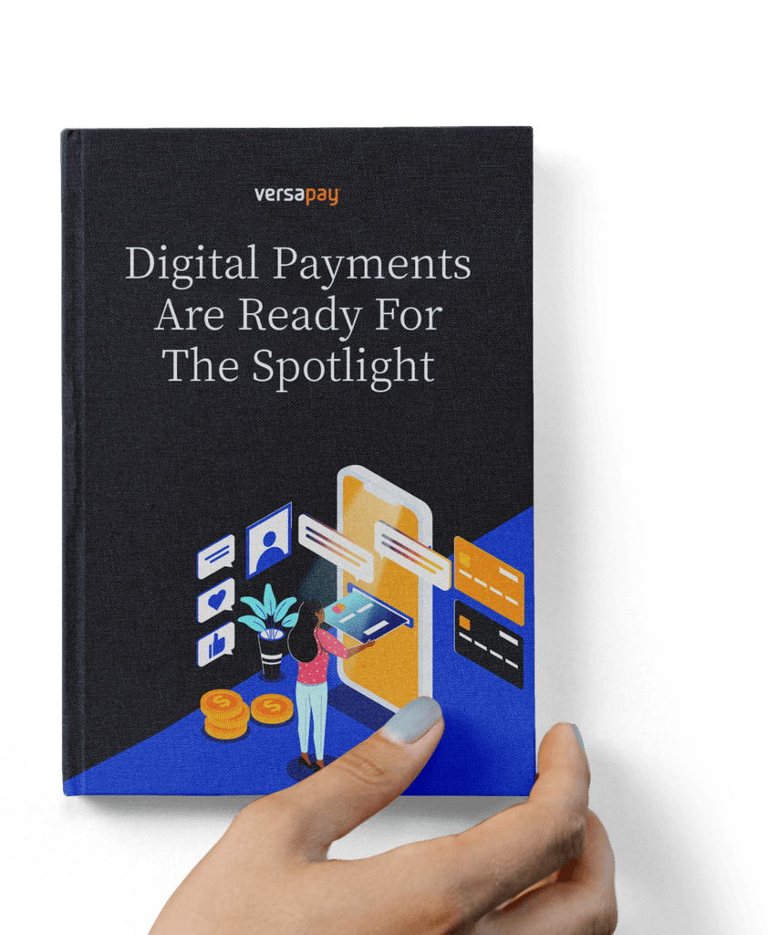 Hand holding the Digital Payments Are Ready For The Spotlight report