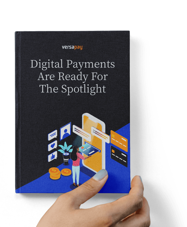 Hand holding the Digital Payments Are Ready For The Spotlight report
