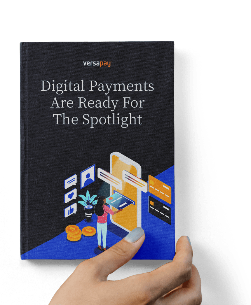 Hand holding the Digital Payments Are Ready For The Spotlight report