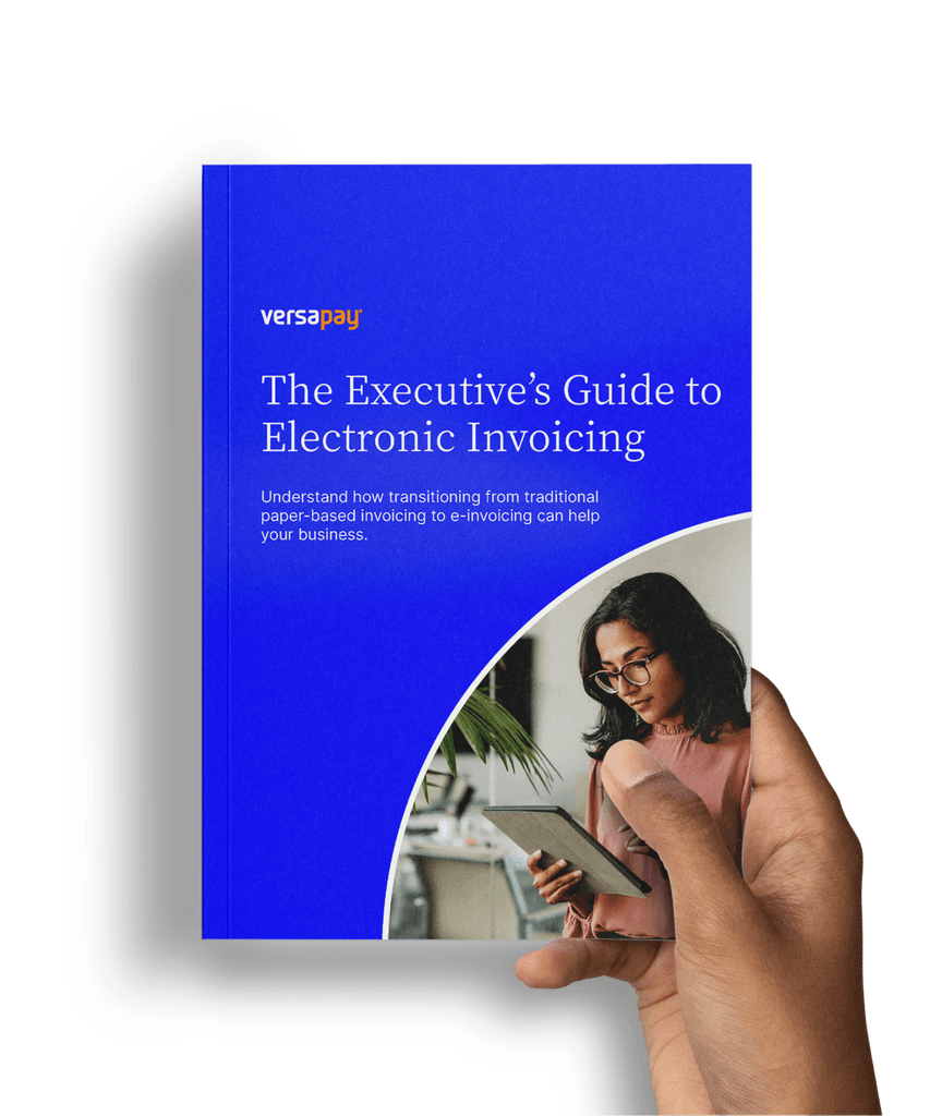 Hand holding The Executive's Guide to Electronic Invoicing