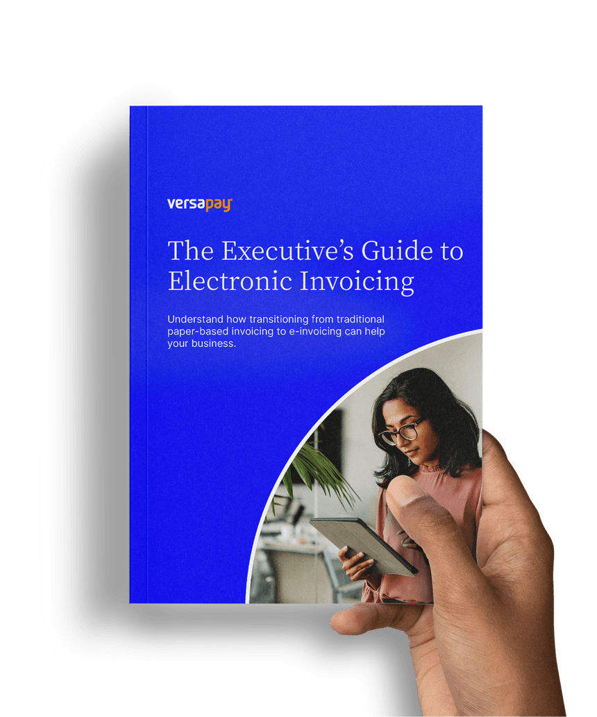 Hand holding The Executive's Guide to Electronic Invoicing