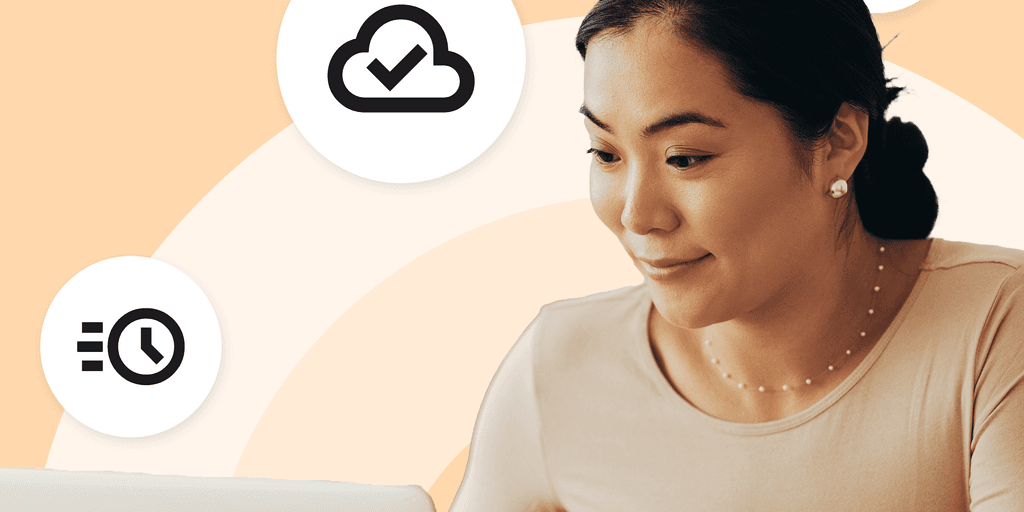 Woman sits at her laptop; she's streamlining her accounts receivable in Microsoft Dynamics 365