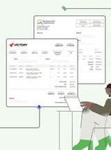 Personalized invoices are enlarged infront of an accounts receivable professional