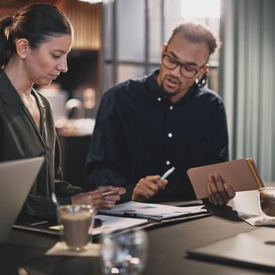 Man and woman going over documents