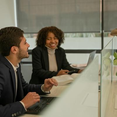 Employees talking in the office