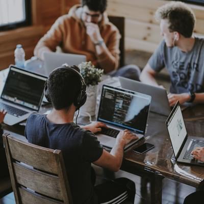Employees working on a desk