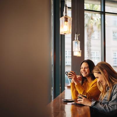 Two women having coffee