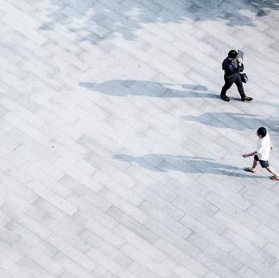 Walking on grey pavements