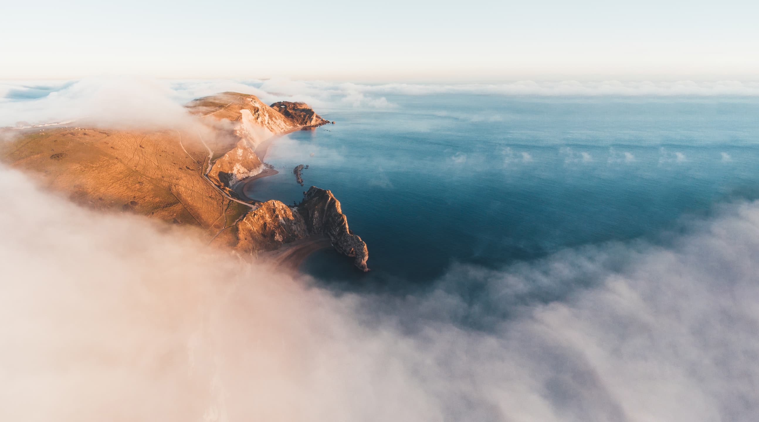 Clouds sea and land