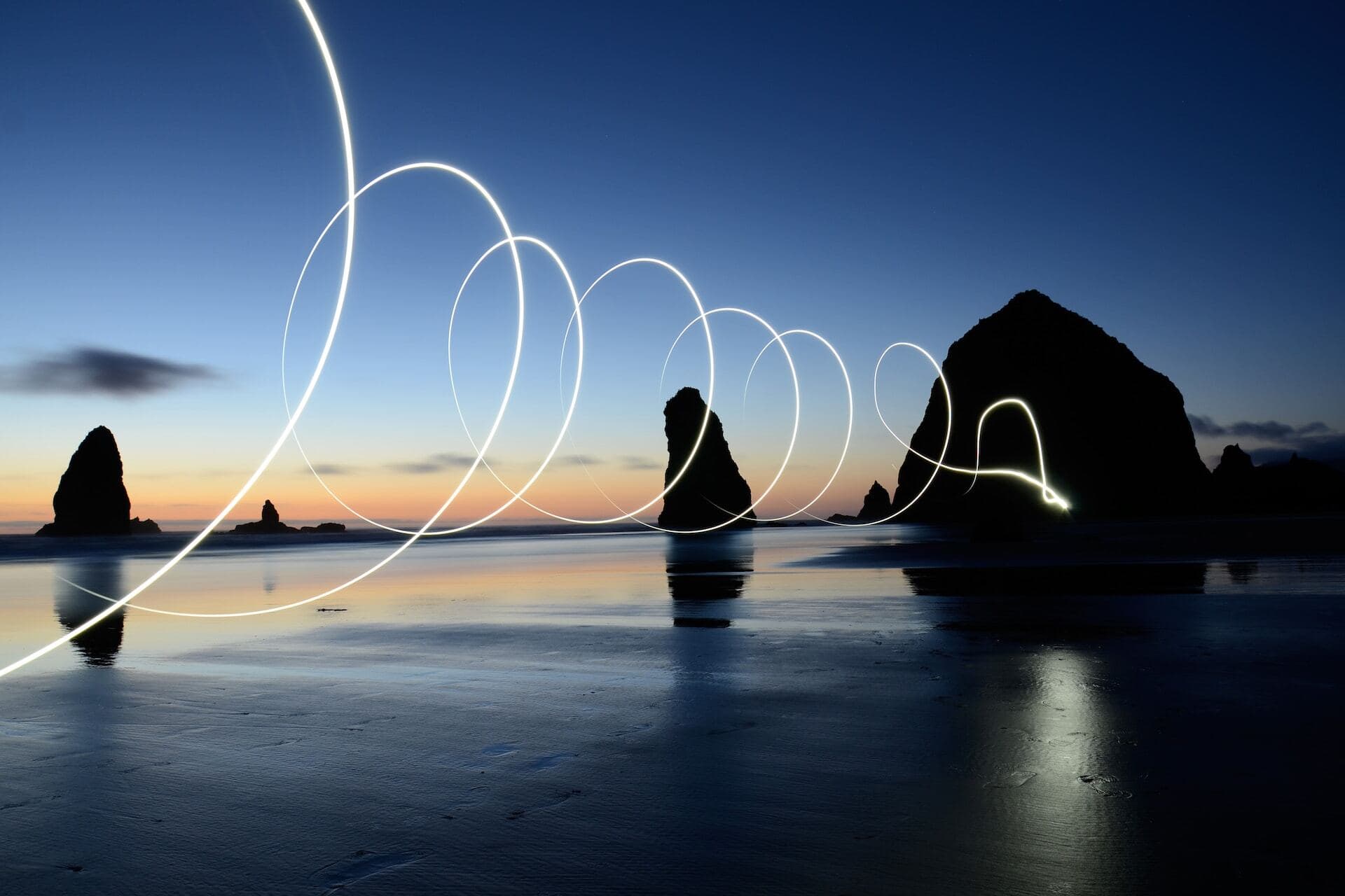 Swirling light over water