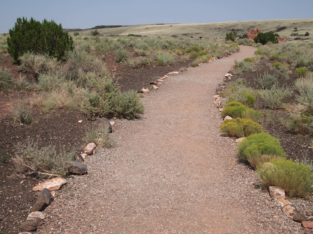 Crusher fines trail lined with native rock; Lomaki Wupatki National Monument, AZ.