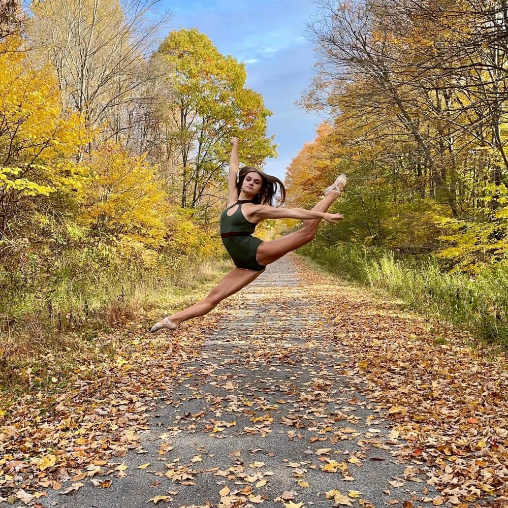 Young dancer, Eden, takes advantage of the fall scenery of the Ghost Town Trail to pose for a dance photo.