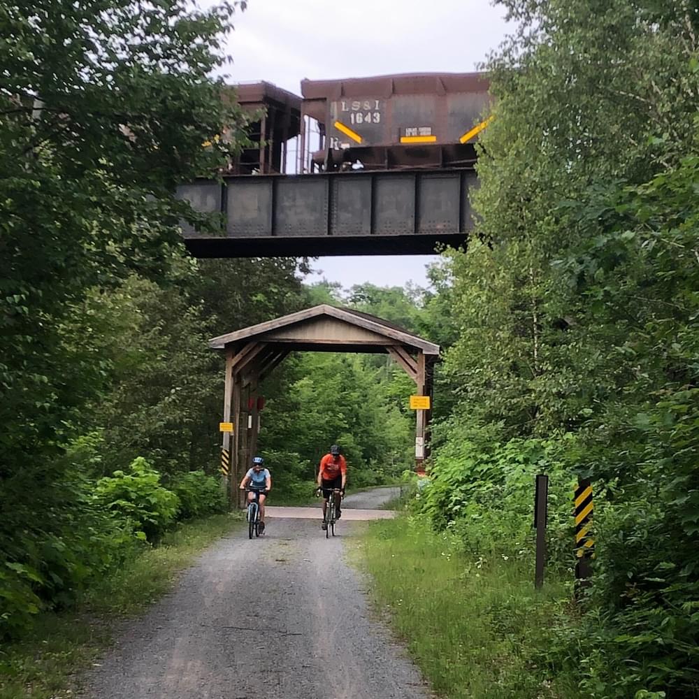 Trail under Rail, biking underneath trestle