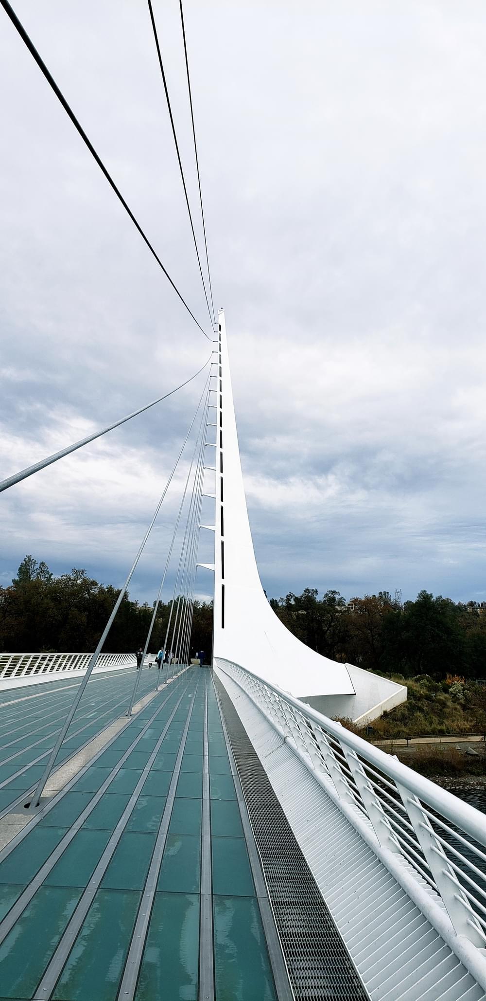 The Sundial Bridge; a mixture of glass, steel and concrete spans the Sacramento River in Redding, California.