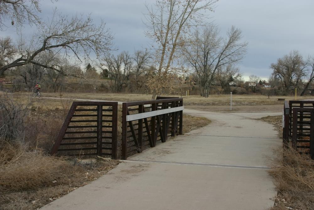 Short bridge with continuous concrete trail surface on the Big Dry Creek Trail in Westminster, Colorado