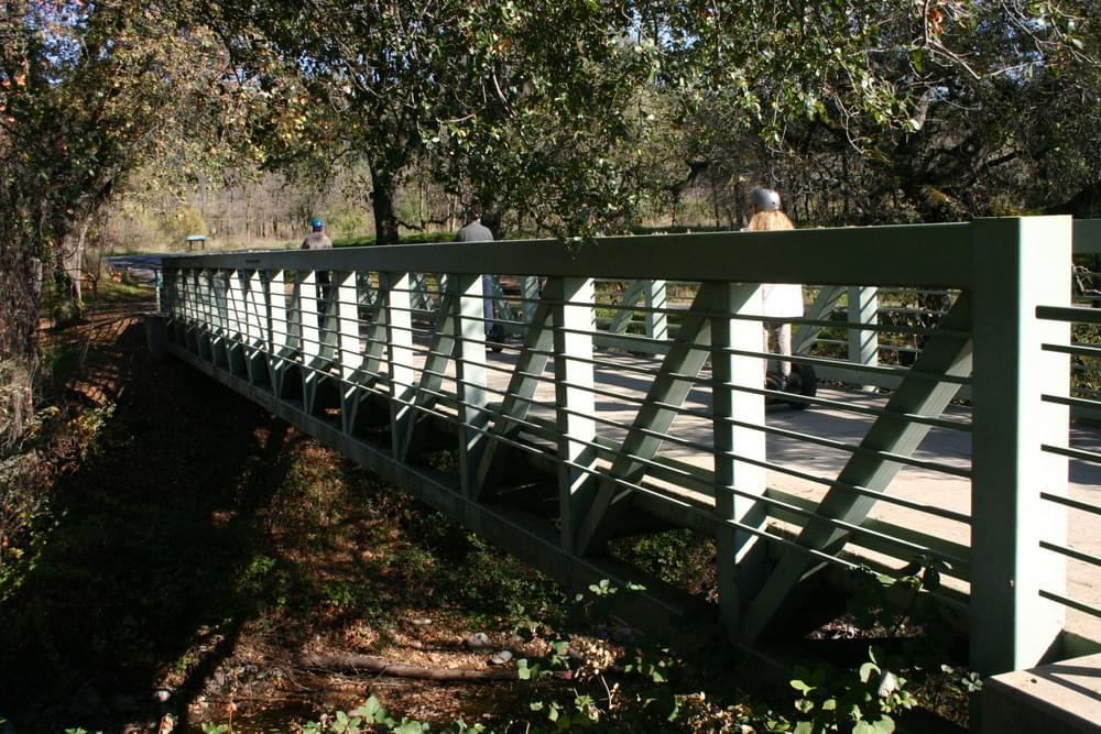 Steel bridge crossing on the Sacramento River Trail in Redding, California