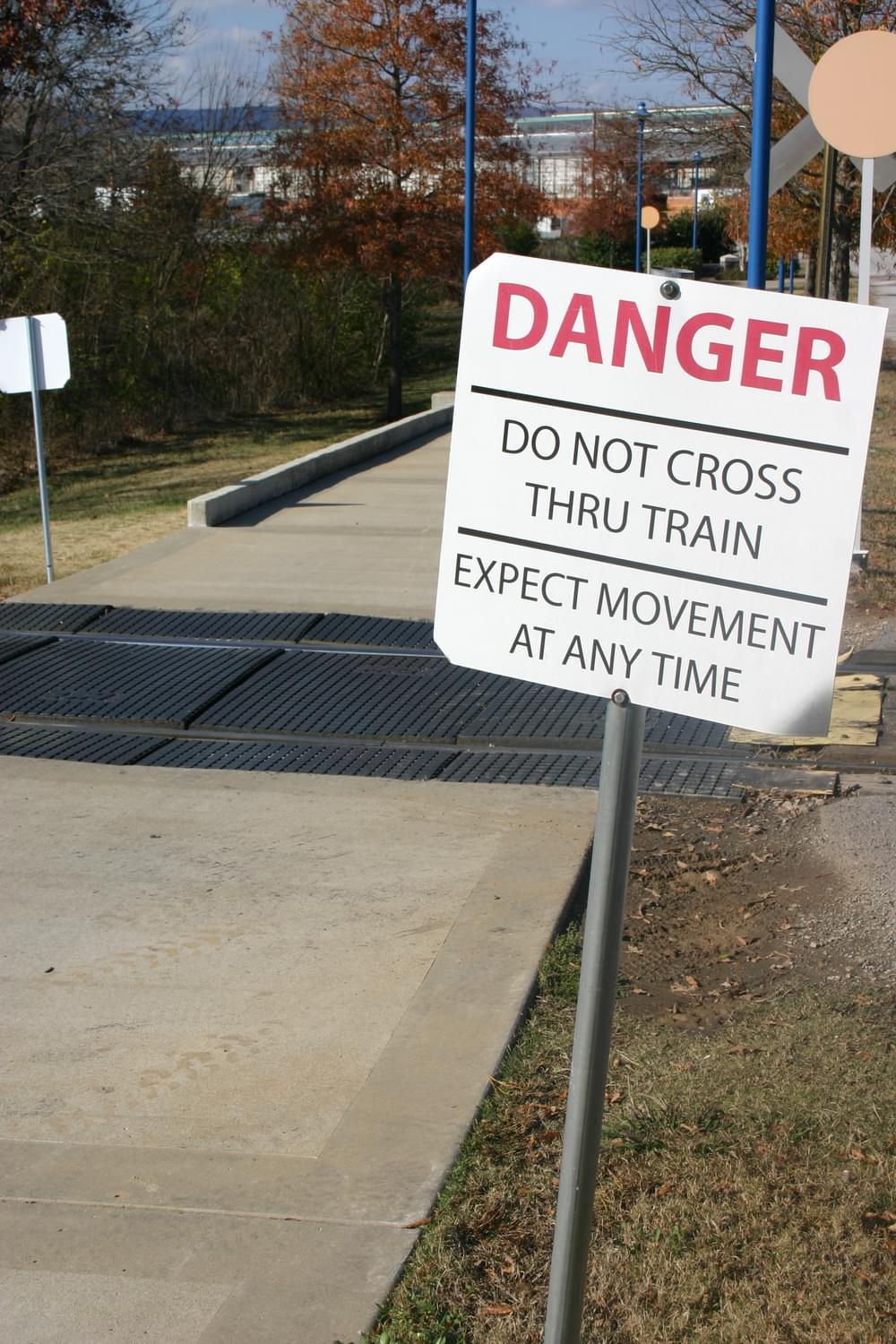 Trail users warned about trying to climb through a stopped train; Chattanooga, Tennessee