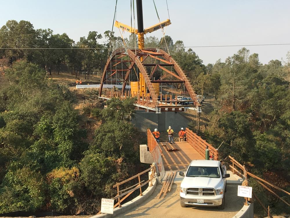 Construction of the 190-foot wooden pedestrian and cyclist bridge spanning a deep section of the American River Canyon called Robber’s Ravine.
