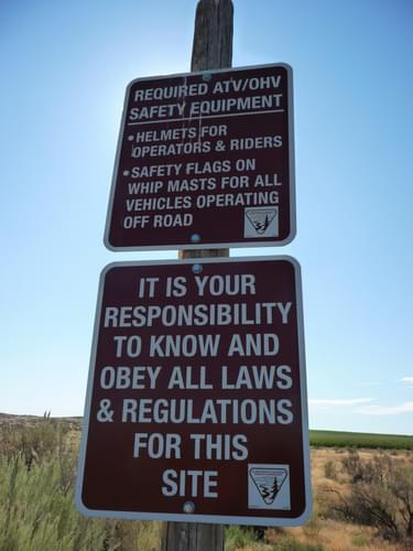 Safety sign in Juniper Dunes Wilderness and OHV Area, Washington; photo BLM Spokane District Office
