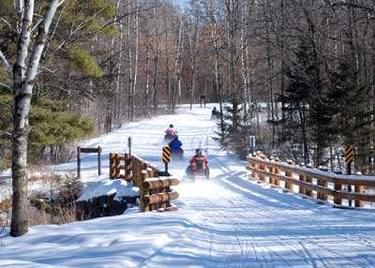 MINNESOTA HAS OVER 22,000 MILES OF SNOWMOBILE TRAILS