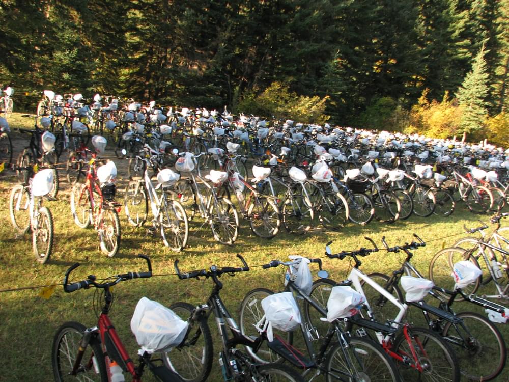 George S. Mickelson Trail Trek Bicycle Ride. How to park 600 bikes in an open lot, volunteer Mike Cody came up with the idea of using two end posts, rope strung between them and two big, wide rubber bands per bike