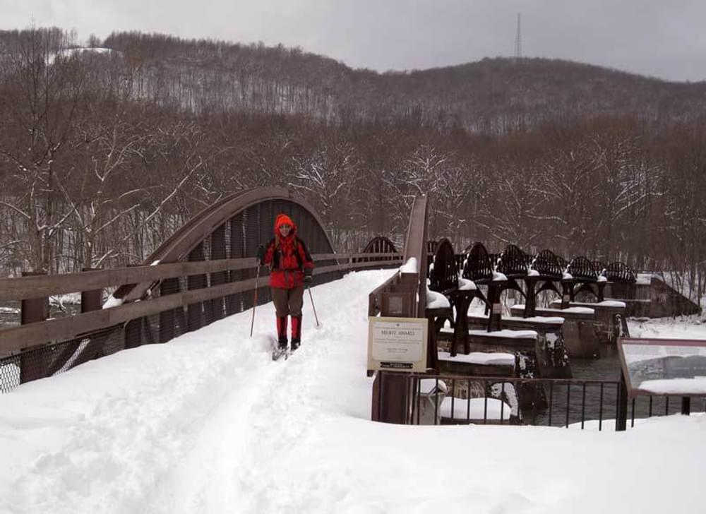 Winter offers cross-country skiing on the Youghiogheny River Trail. 