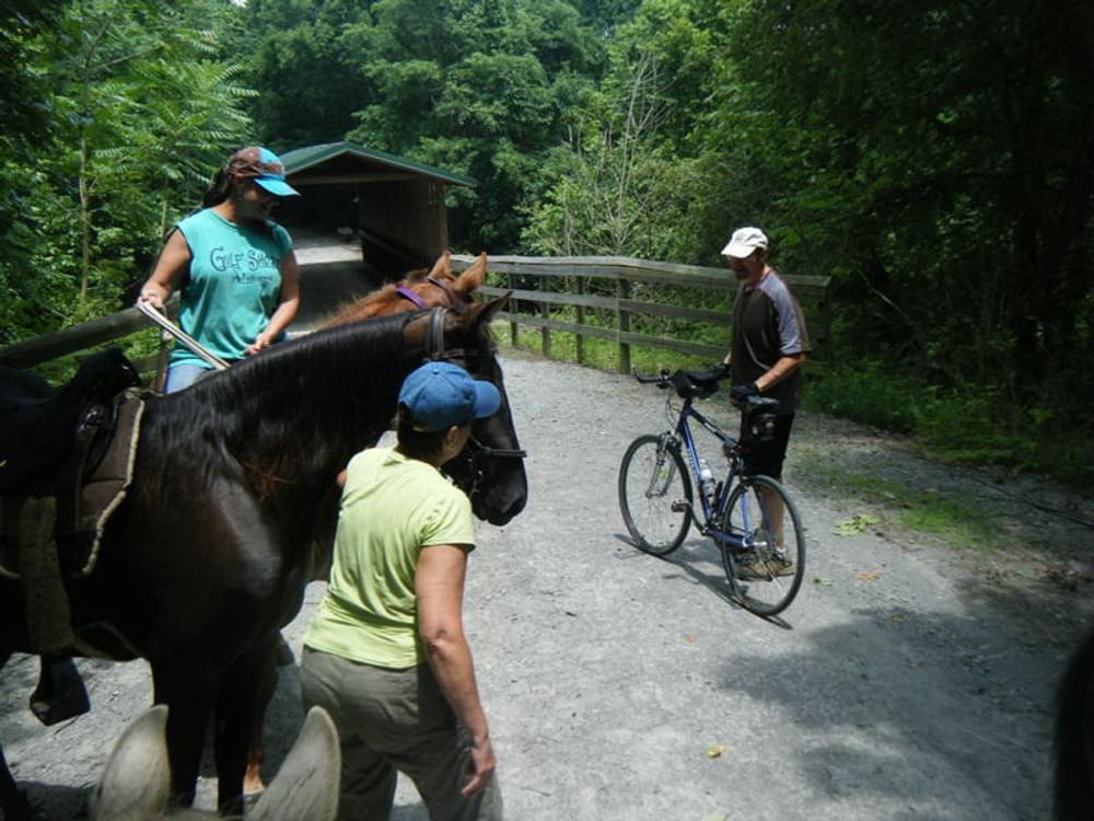 Equestrians and cyclist meet on the Richard Martin National Recreation Trail; Elkmont, Alabama