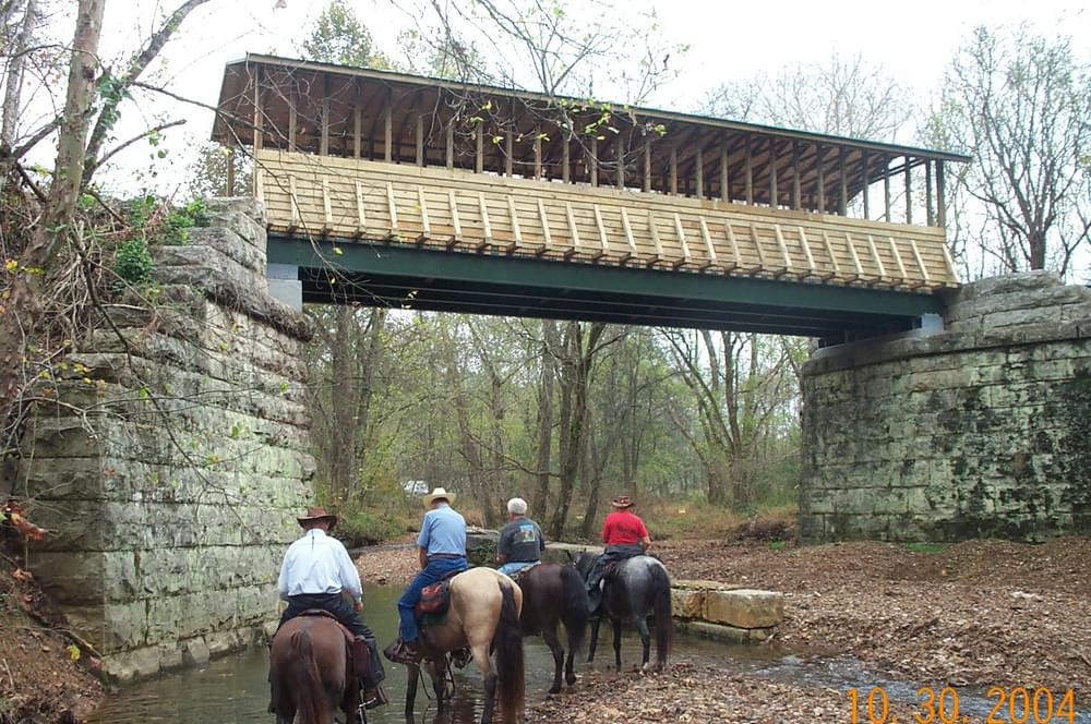 New covered bridge built on the abutments of former railroad on Richard Martin National Recreation Trail; Elkmont, Alabama