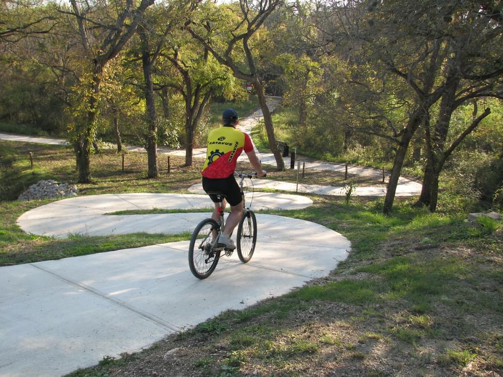 Climbing turns, rather than switchbacks, on the paved Medina River Greenway in Texas