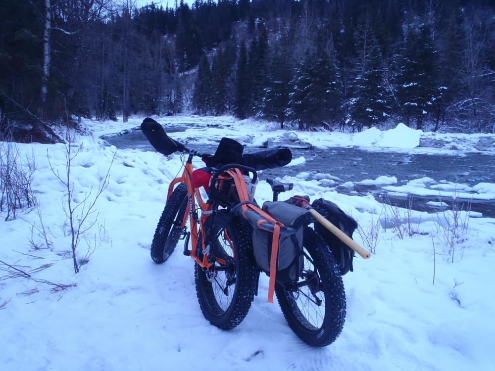 Fat tire bikes on the snowy trail along Resurrection Creek, Chugach National Forest, Alaska