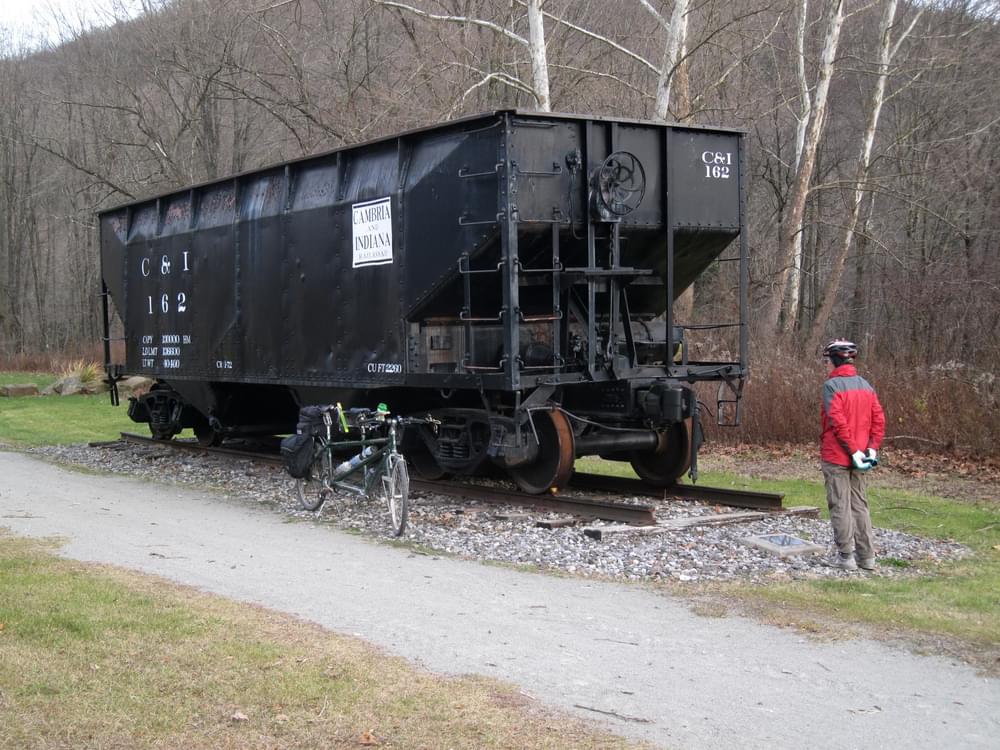 A restored hopper car beside the trail at Rexis spur west of Vintondale, Pennsylvania