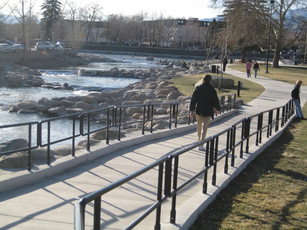 Ramp in downtown Reno, Nevada to trail along Truckee River; note level landing above pedestrian