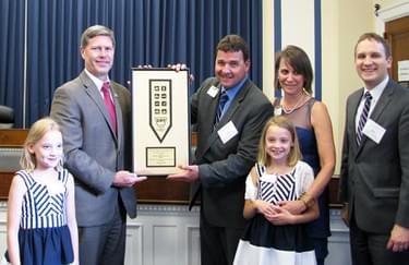 U.S. Representative Ron Kind with Jon Schweitzer, Jackson County Forestry and Parks; Nicole Schweitzer and their daughters; and (far right) Kyle Roskam from the Office of Wisconsin Governor Scott Walker
