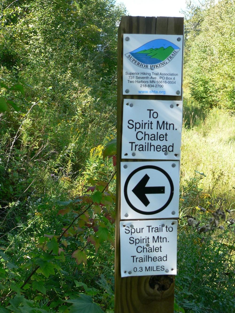 Sign where spur trail takes off from the Superior Hiking Trail in Duluth, Minnesota