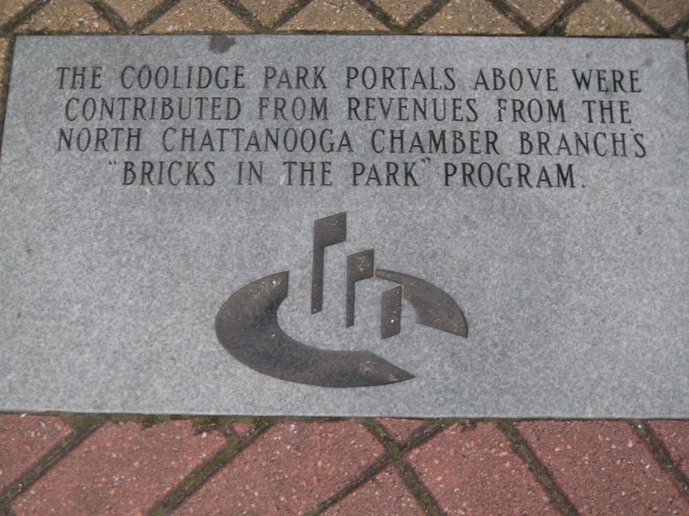 A plaque set into the paving credits trail improvements in North Chattanooga's Coolidge Park