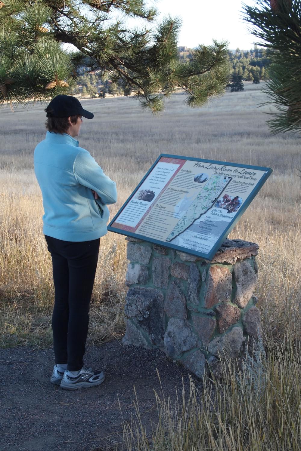 Sign at Elk Meadow Park tells visitors about the role their sales tax pays in preserving Jefferson County's Open Space; Denver, Colorado