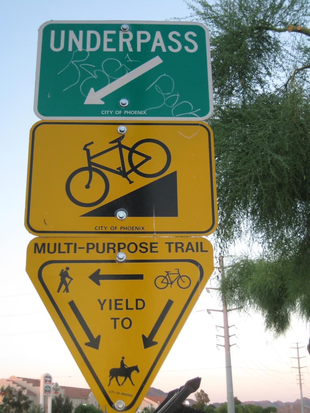 Patterned after the highway yield sign, the standard trail users yield sign; Phoenix, Arizona