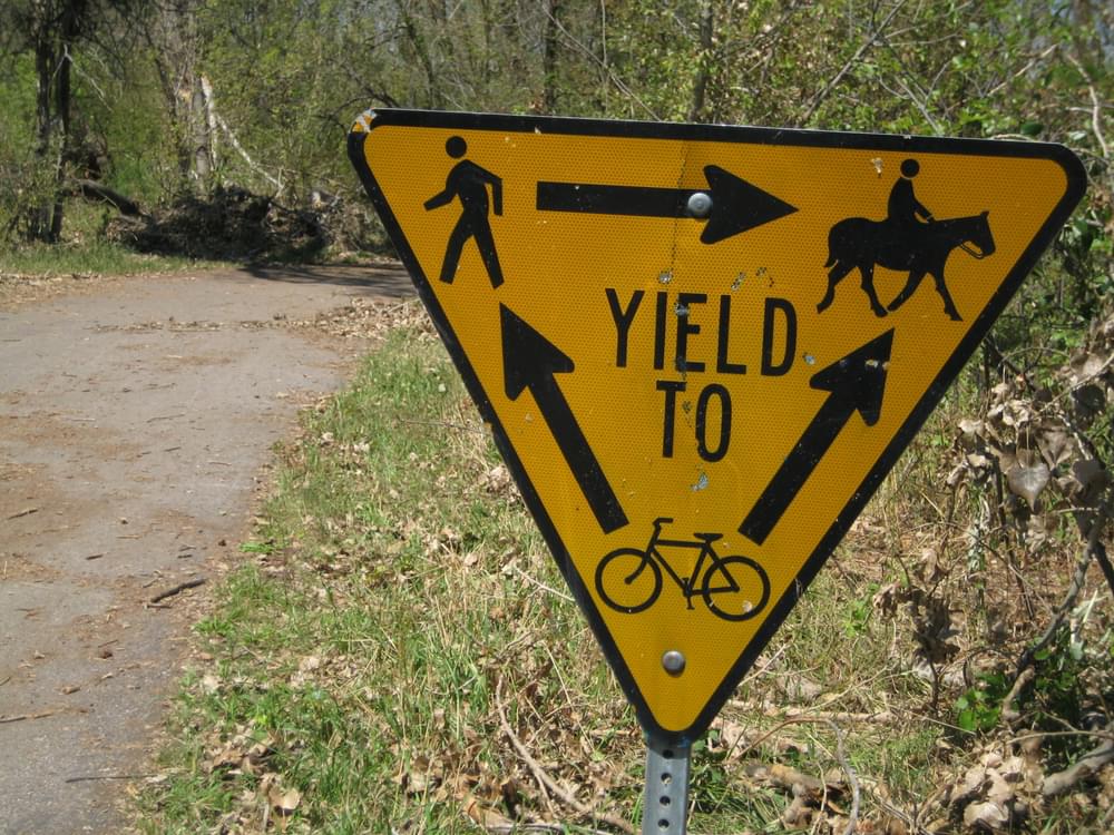 Bicyclists yield to walkers, and everyone yields to horses; Clear Creek National Recreation Trail, Wheat Ridge, Colorado
